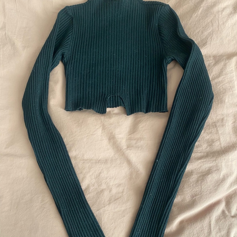 Black mock neck ribbed long sleeve crop top with cutout